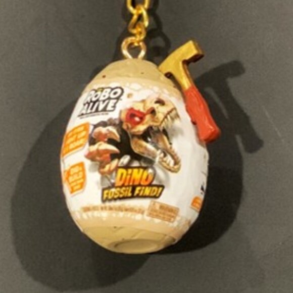 Robo Alive Dino Fossil Find Keychain – Mini Dino Egg Adventure - Picture 5 of 10